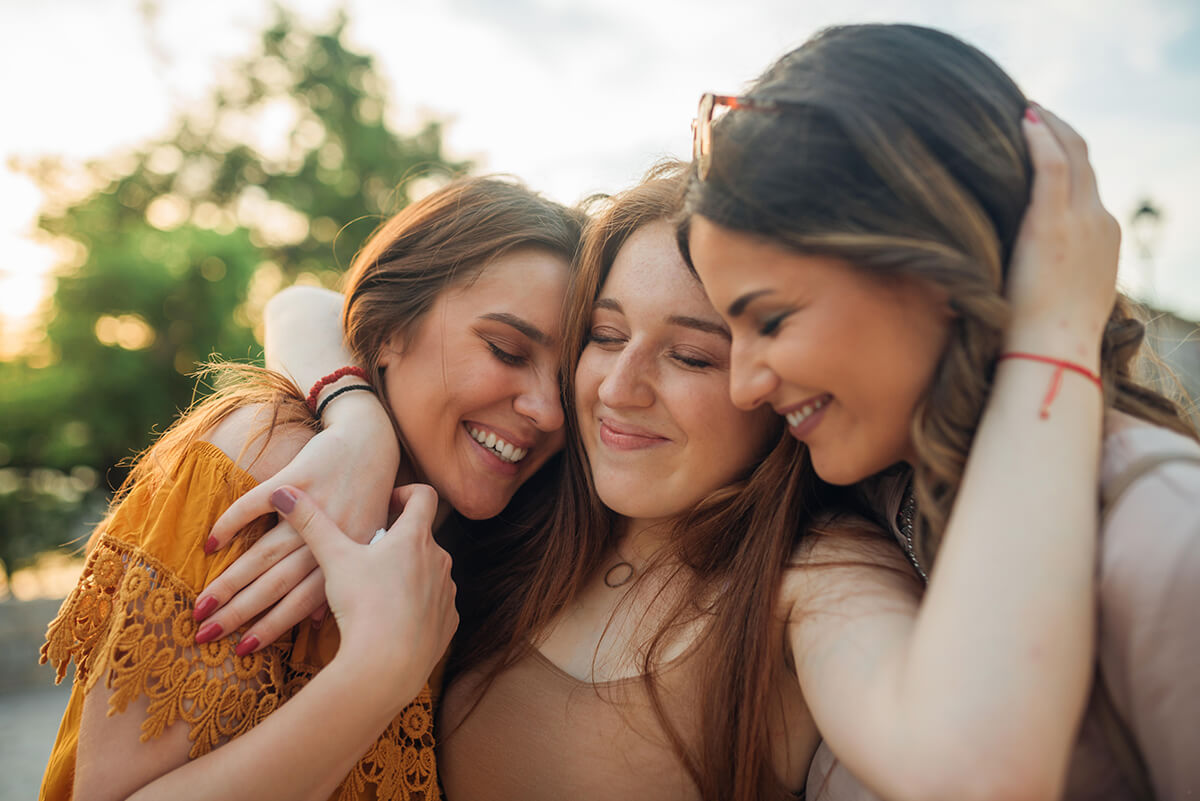 Women Hugging Each Other